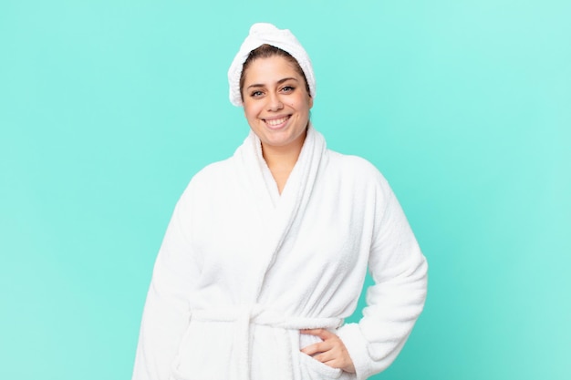 Curvy pretty woman after a shower wearing bathrobe