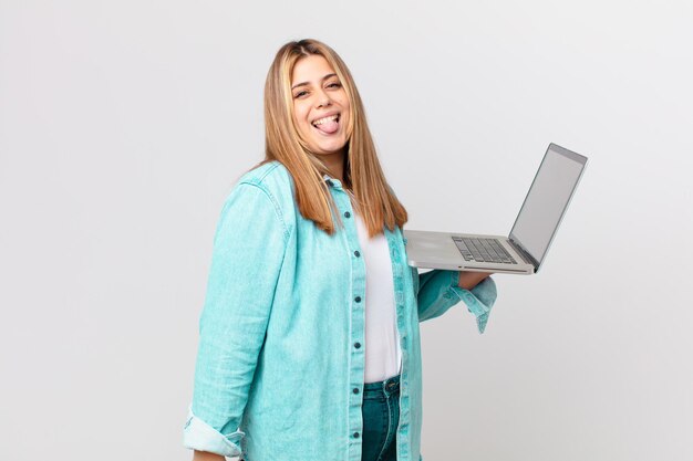 Curvy pretty woman holding a laptop