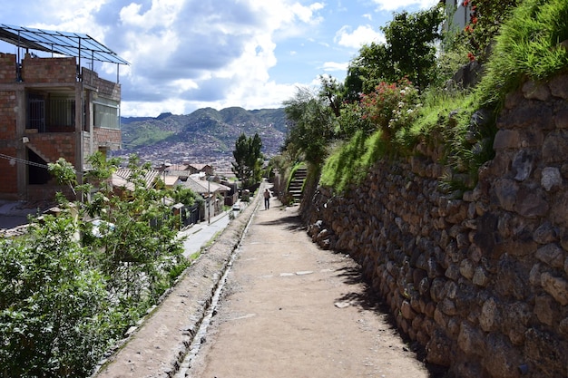 Cusco straat met prachtige oude architectuur Geplaveide straat van de oude stad Cusco
