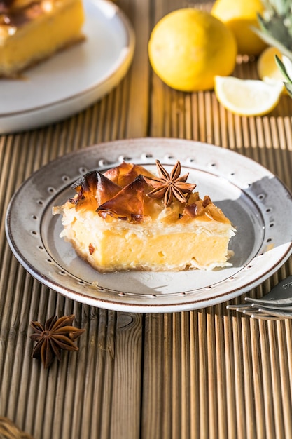 Custard of Galaktoboureko or bougatsa Greek traditional dessert baked in a pan with syrup its called Thessaloniki pie Handmade phyllo stuffed with sweet semolina cream