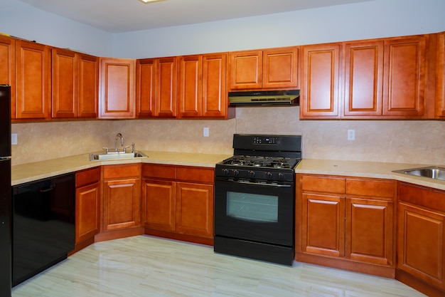 Custom kitchen cabinets in various stages of installation base for of kitchen cabinets