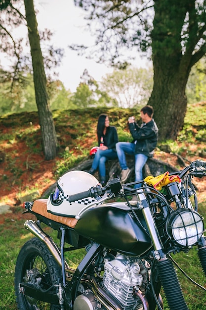 Custom motorbike with young couple