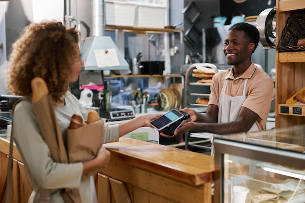 Customer Buying Bread