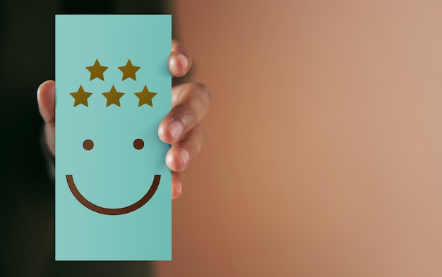 Customer Experience Concept. Happy Client giving Positive Review on Paper Card. Client's Satisfaction Surveys