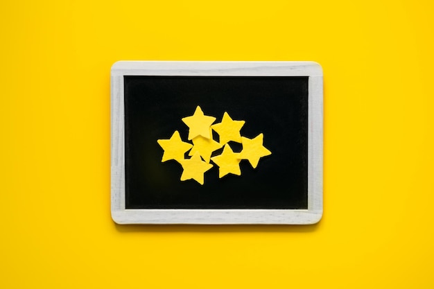 Customer experience review concept many yellow stars negative online reviews rating in frame on