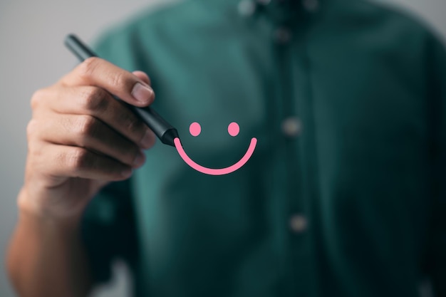 The customer responded to the survey in a conceptual way. The client creates a happy face smiling icon with a digital pen. The concept of customer happiness and service experience.