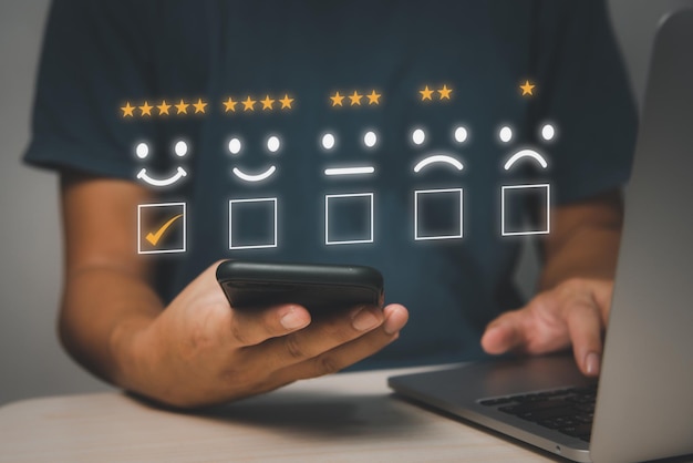 Customer review satisfaction feedback surveyGive very satisfied rating with smiley face icon service experience on online application concept