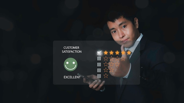 Customer satisfaction experience concept Businessman choosing happy smiley face icon to give satisfaction in service