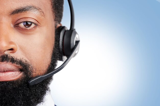 Photo customer service headset portrait and serious black man in studio consultation help desk support or contact us service telemarketing space face and african person on mockup blue background banner