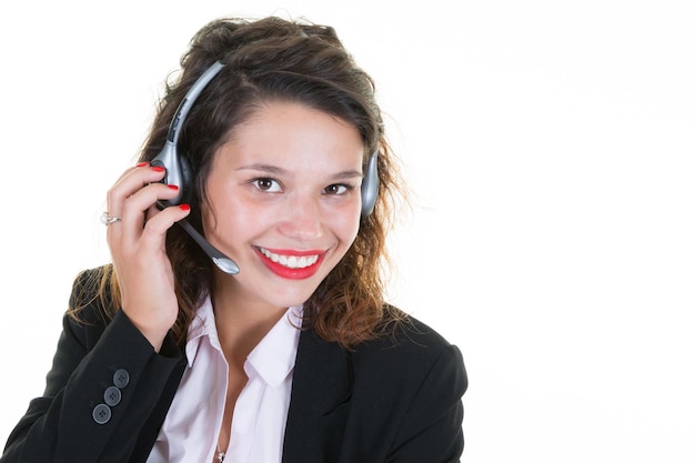 Customer service smiling woman in operator call center with headphones