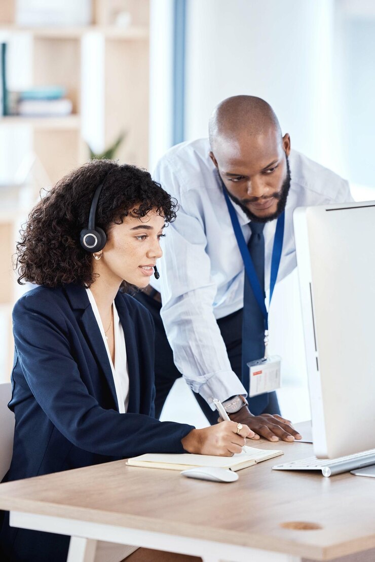 Photo customer support mentor computer consulting and black people telemarketing on contact us crm or telecom teamwork e commerce call center and training information technology consultant on microphone