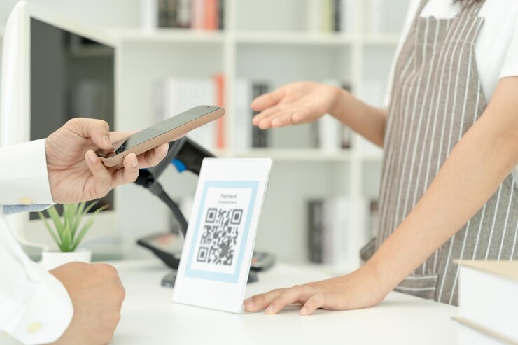 Photo customer use smartphones to scan qr codes to pay instore with digital payments without cash scanning get discounts e wallet technology online payment banking app smart city money transferxa