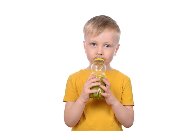 Photo cut boy drinking fresh fruit juice