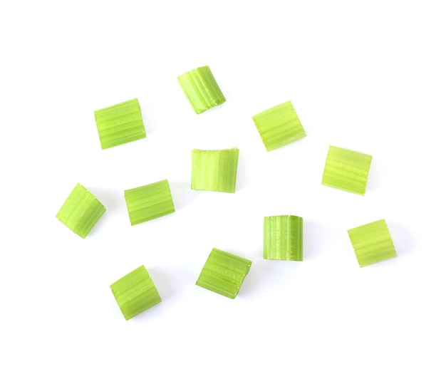 Cut celery sticks isolated on white background