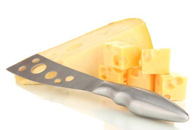 Cut cheese with knife isolated on white