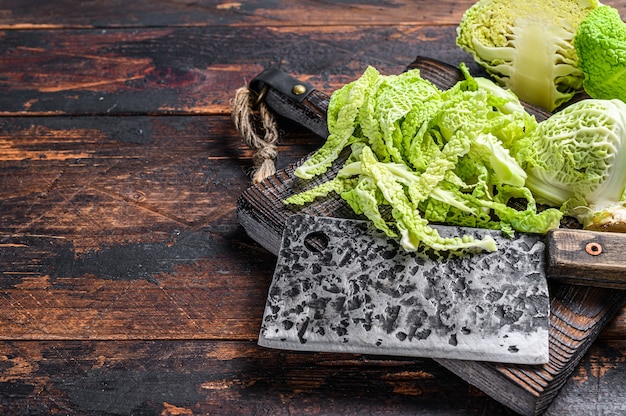 Cut Fresh healthy savoy cabbage on cutting board