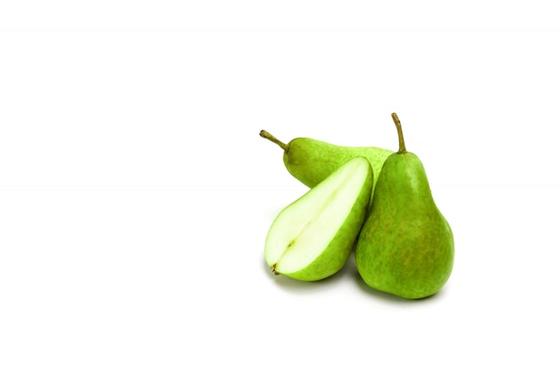 Cut green pear and slice on a white , compositionfruits. Isolate.