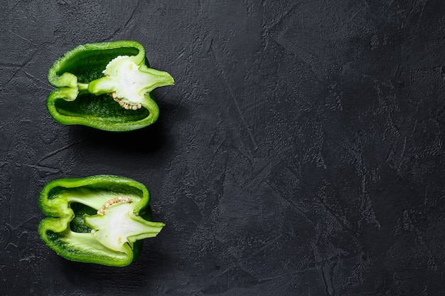 Cut green sweet pepper, two halves. 