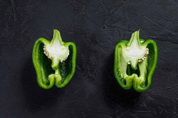 Cut green sweet pepper, two halves.