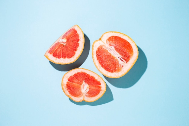 Cut halves of grapefruit . Top view, flat lay