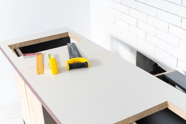 to cut holes in the kitchen countertop for equipment