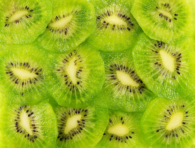 Cut kiwi fruit. Close-up background texture