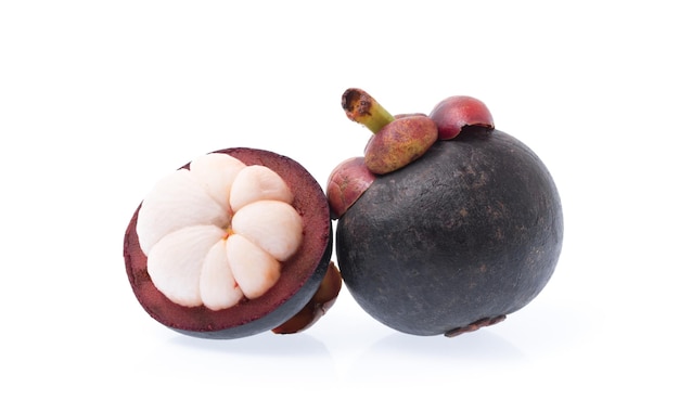 cut of Mangosteens isolated on white background