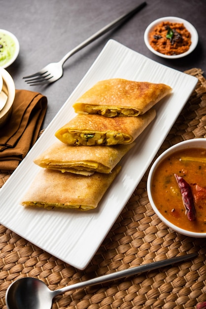 Cut Masala dosa or spring dosa is a South Indian meal served with sambhar and coconut chutney