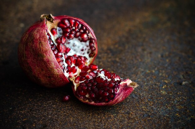 Cut pomegranate with seeds