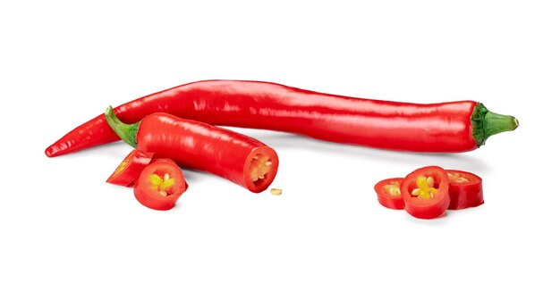 Cut red hot chili peppers Capsicum isolated on white background sliced red hot chili peppers highquality studio shot of red long capsicum top view