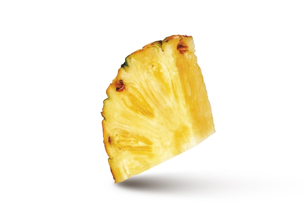 Cut slice of natural ripe fresh pineappe fruit isolated on a white wall