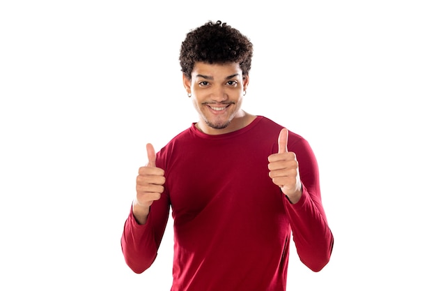 Cute african american man with afro hairstyle wearing a burgundy T-shirt isolated