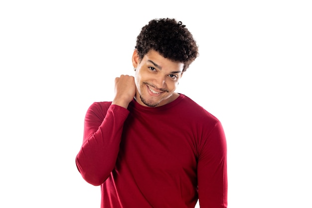 Cute african american man with afro hairstyle wearing a burgundy T-shirt isolated