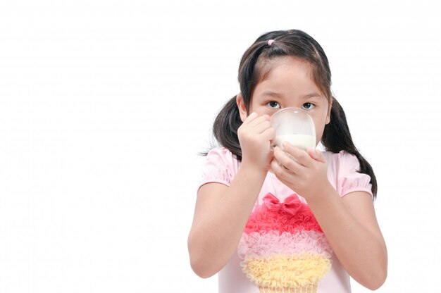 Cute asian girl drinking fresh milk isolated 