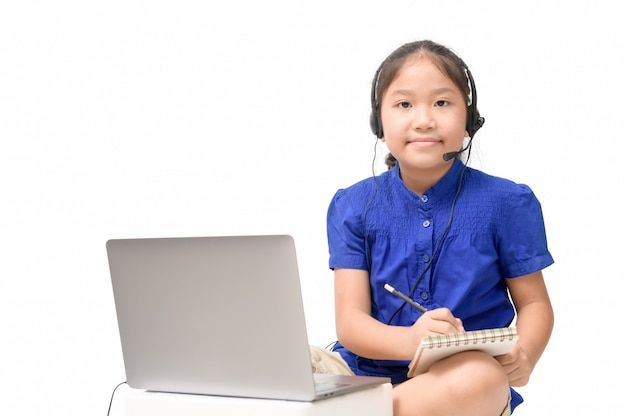 Cute Asian girl wearing headphones