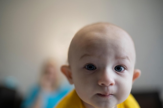 Cute baby boy close up playing at home, lifestyle