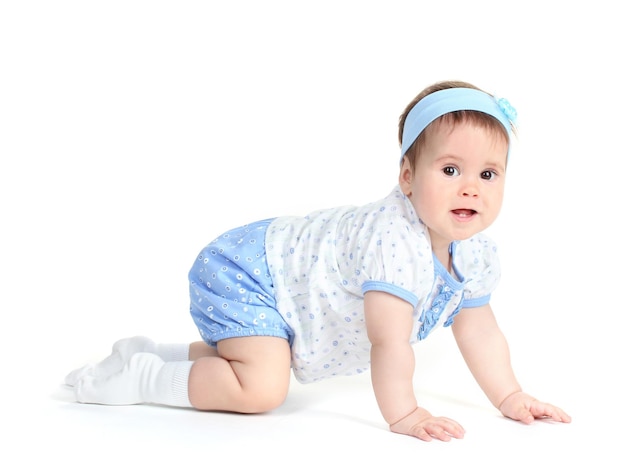 Cute baby girl crawling isolated on white