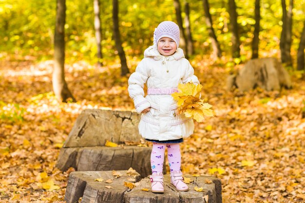 cute baby girl in fall time