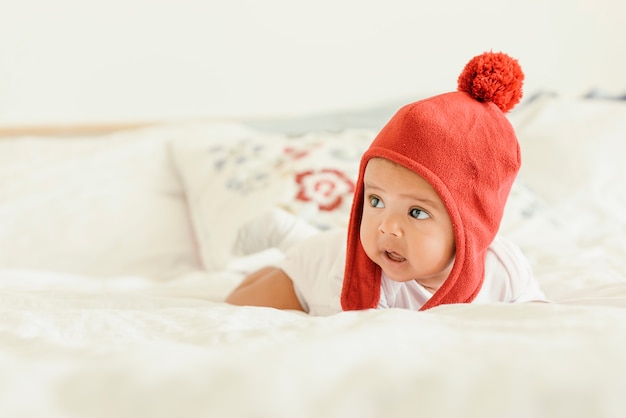 Cute Baby Girl Lying in the Crib