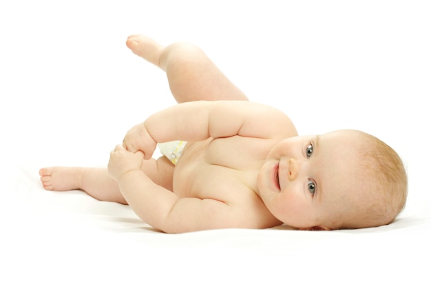 Cute baby girl lying on the floor