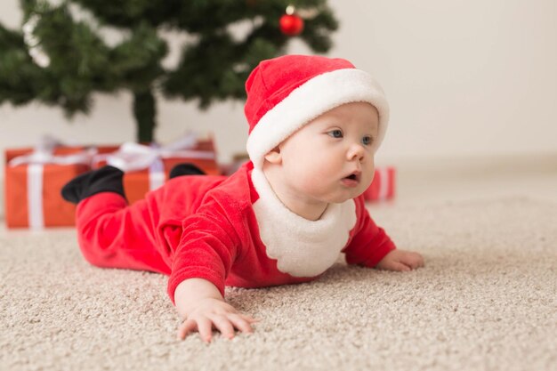 Cute baby girl lying on sofa