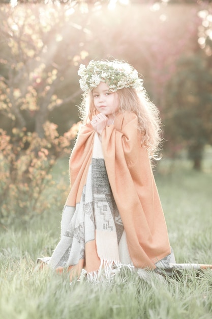 Cute baby girl posing outdoors