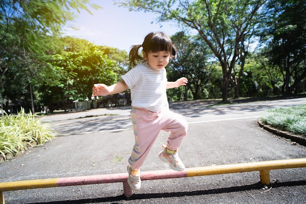 Cute baby Jumping on the road before running