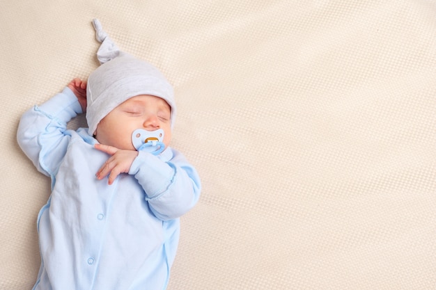 Cute baby sleeping on bed