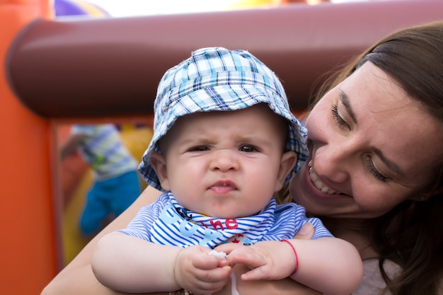 Cute baby with his mother