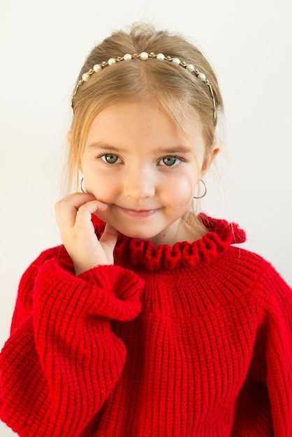 Cute and beautiful girl on a white background