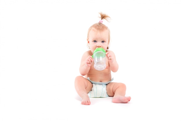 Cute beauty little girl with baby bottle