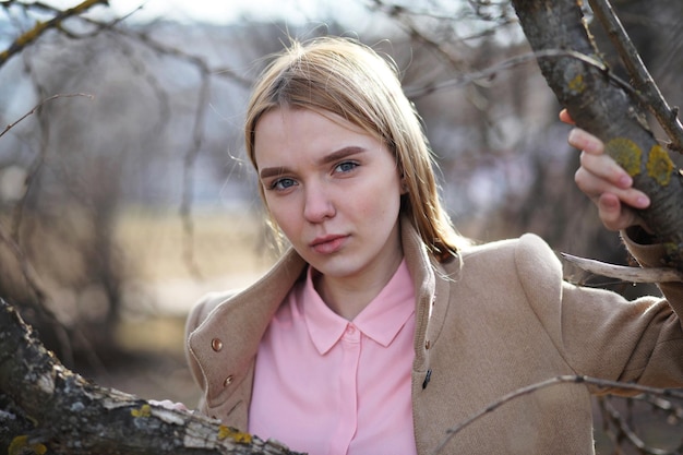 Cute blonde in a city park