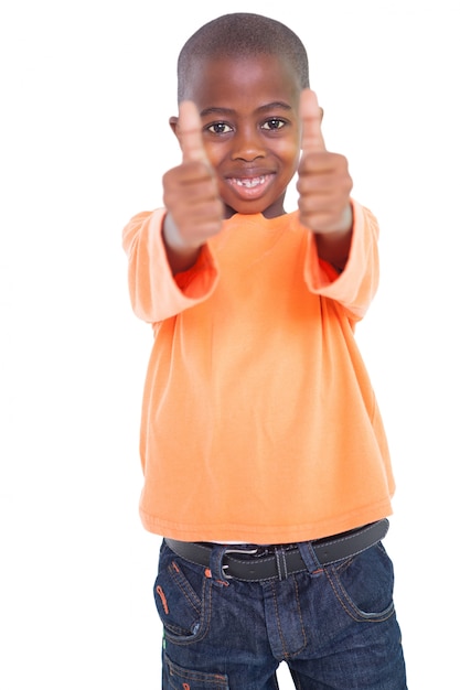 Cute boy showing thumbs up