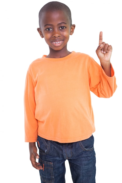 Cute boy smiling and pointing